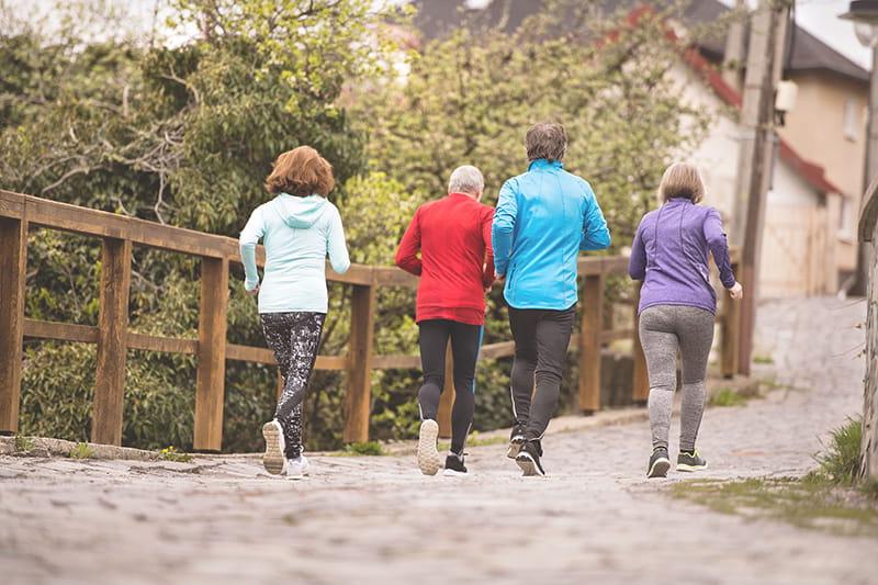 seniors running outdoors